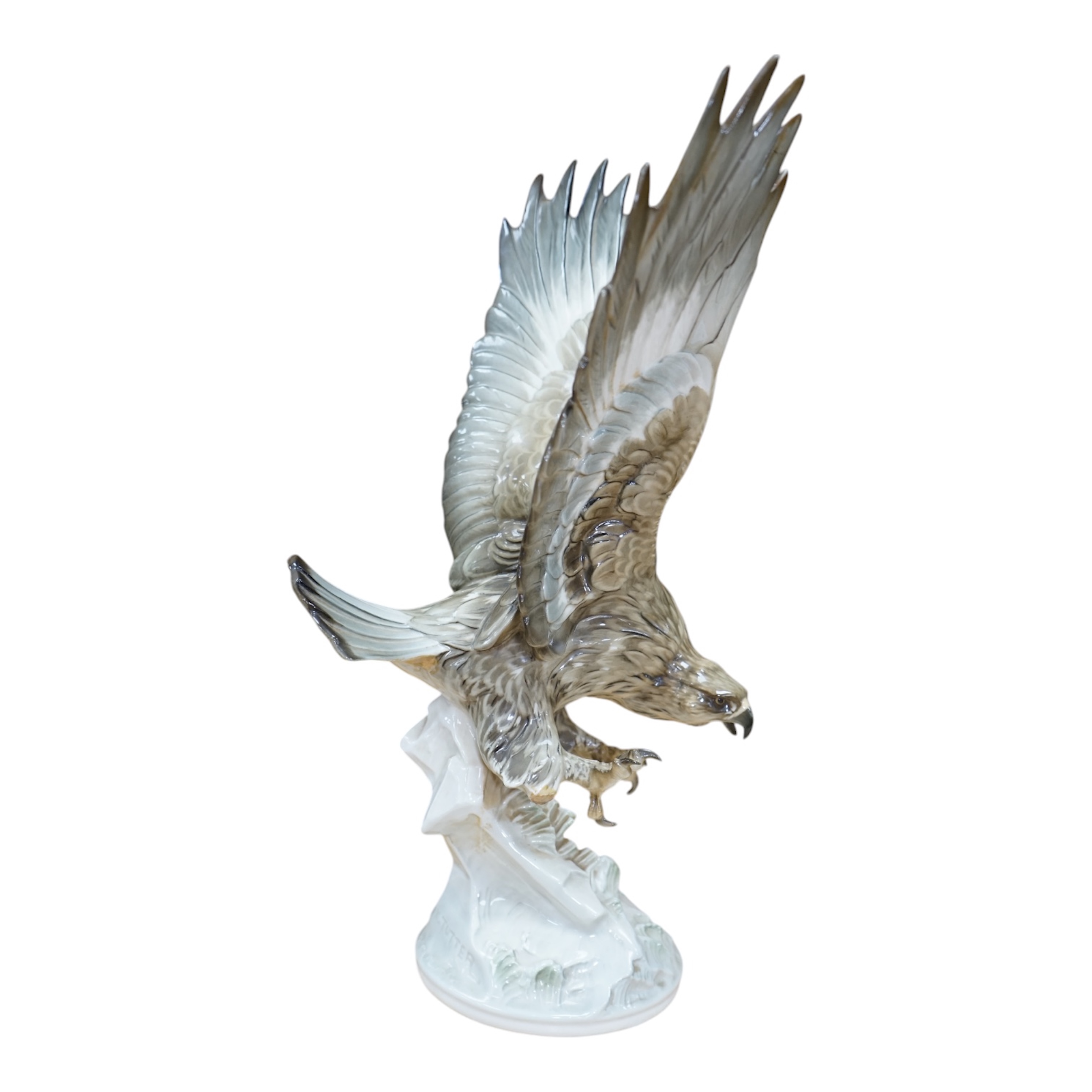 Karl Tutter (1883-1969) for Kutschenreuther, a porcelain model of a hawk, 42cm. Condition - restoration? otherwise good